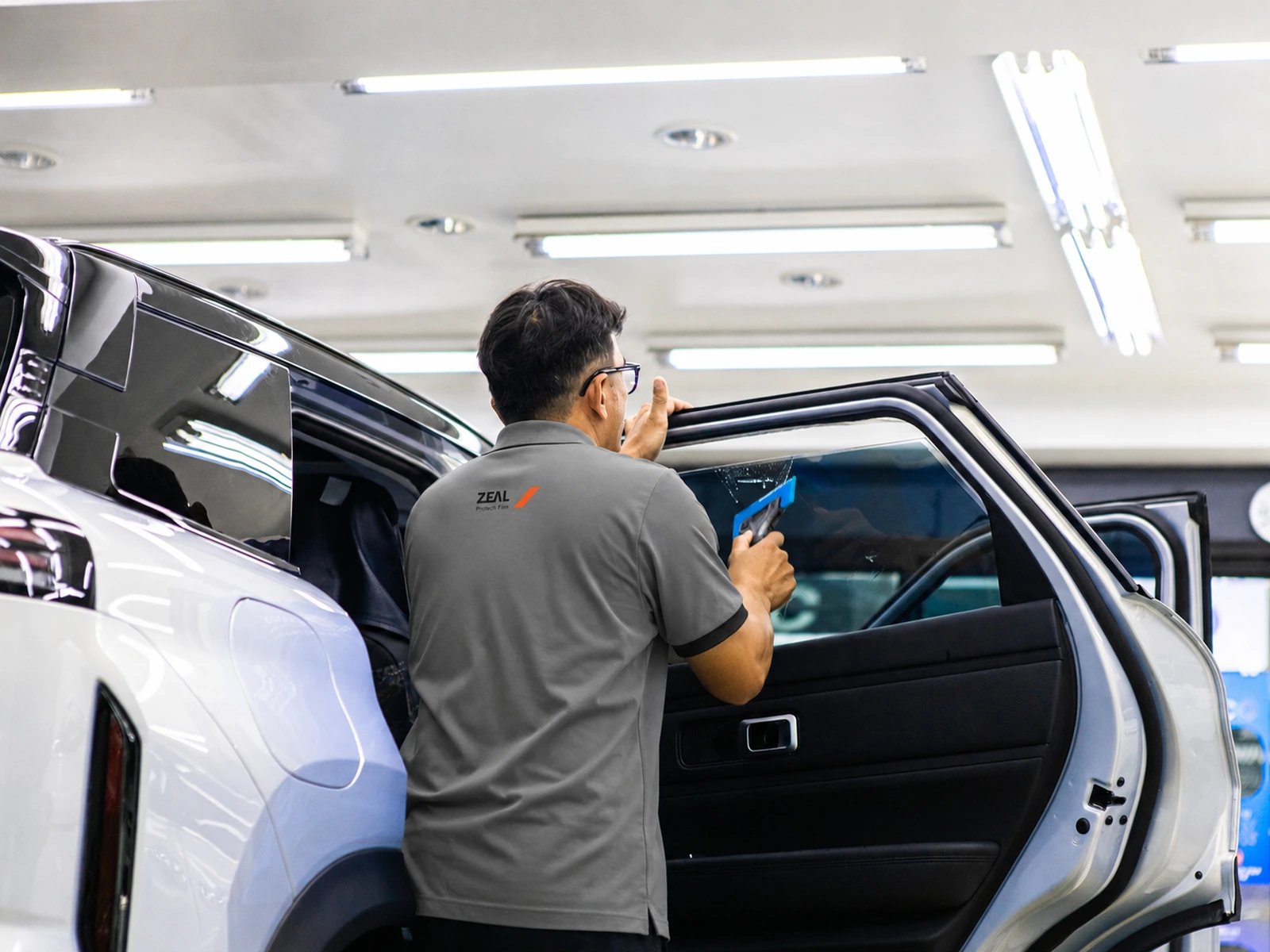 ZEAL window-film installation process at 27Speed, image 5